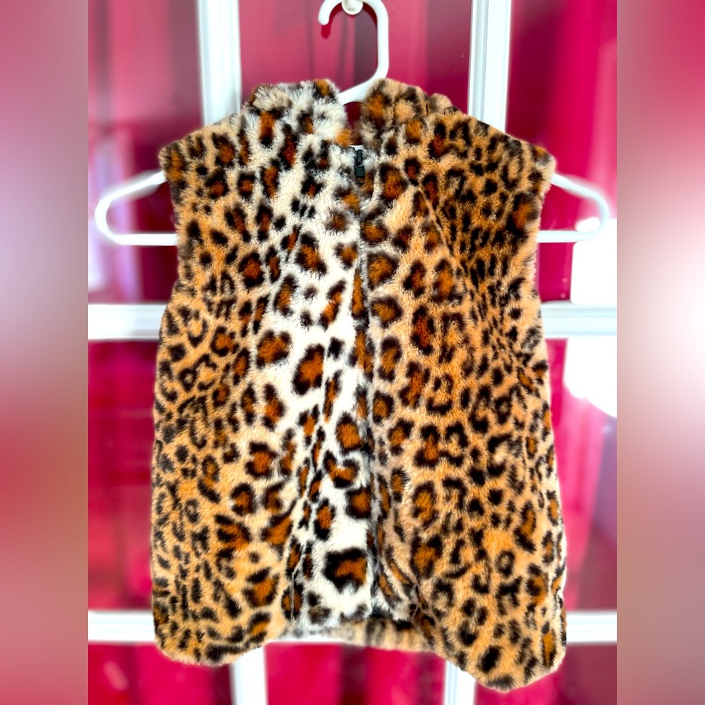 Forever 21. New super soft & cute & warm faux fur hooded vest. Size: 7-8.